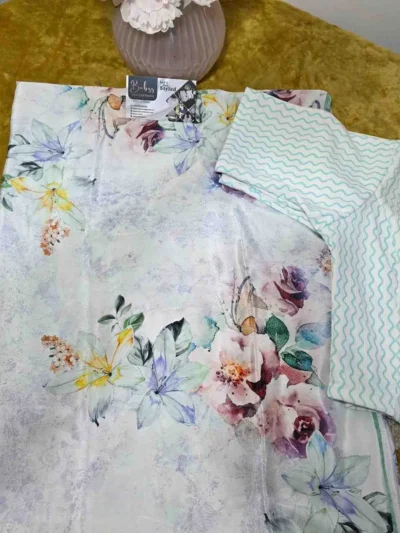 Off-White Silk Saree with Muted Floral Motifs and Aqua Contrast Blouse