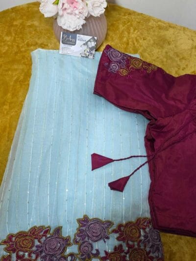 Pastel Blue Saree with Rich Floral Threadwork and Matching Maroon Blouse Set